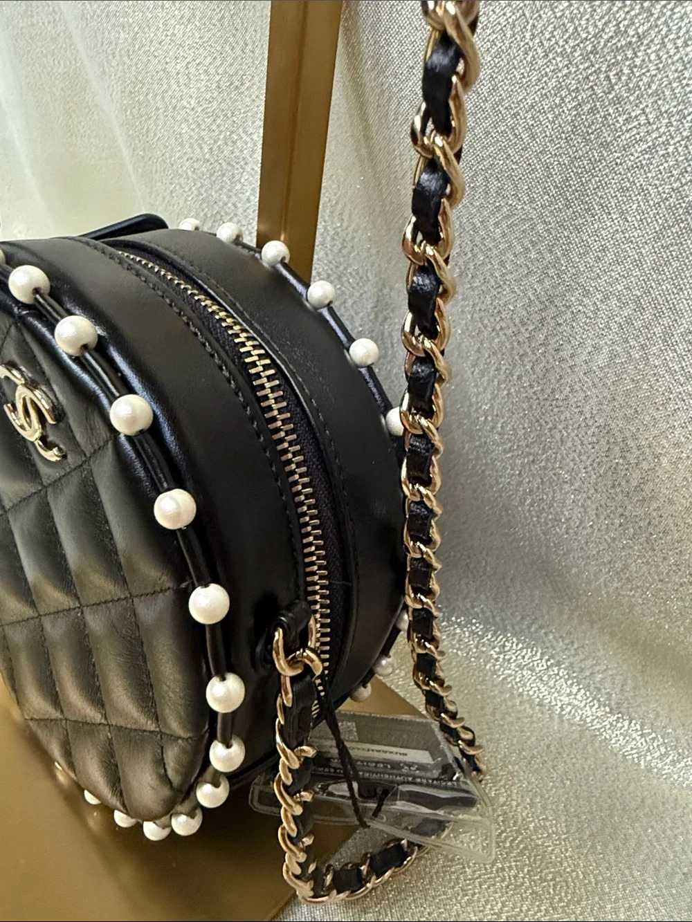 CHANEL Black Lambskin Quilted Round Crossbody with Pearl Trim with Chain